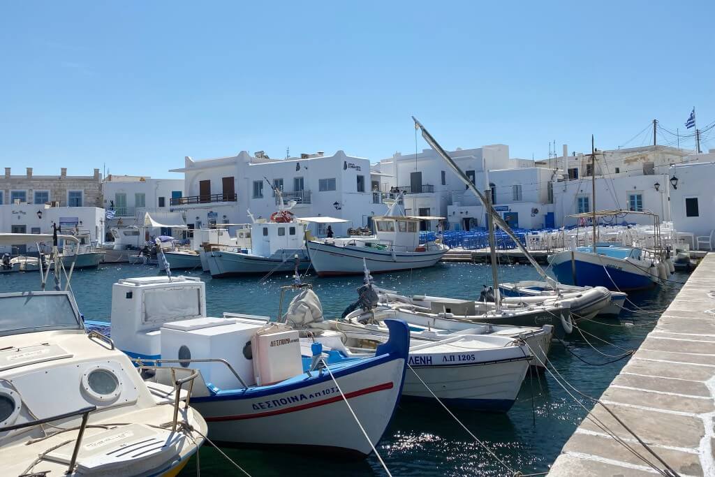 small boats docked in naoussa old port