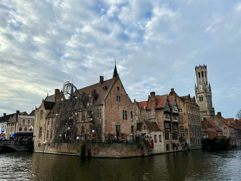 bruges historic buildings along the river during winter