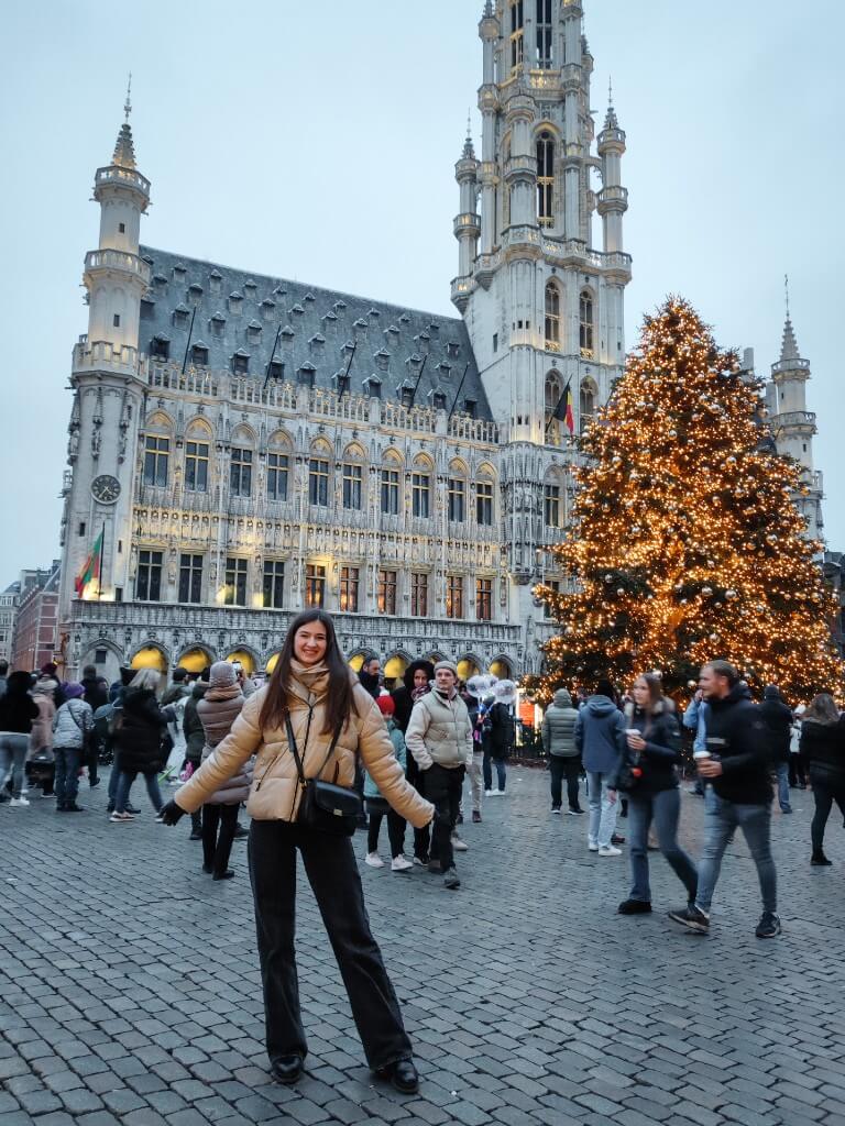 natali on grande place of brussels in front of the christmas tree