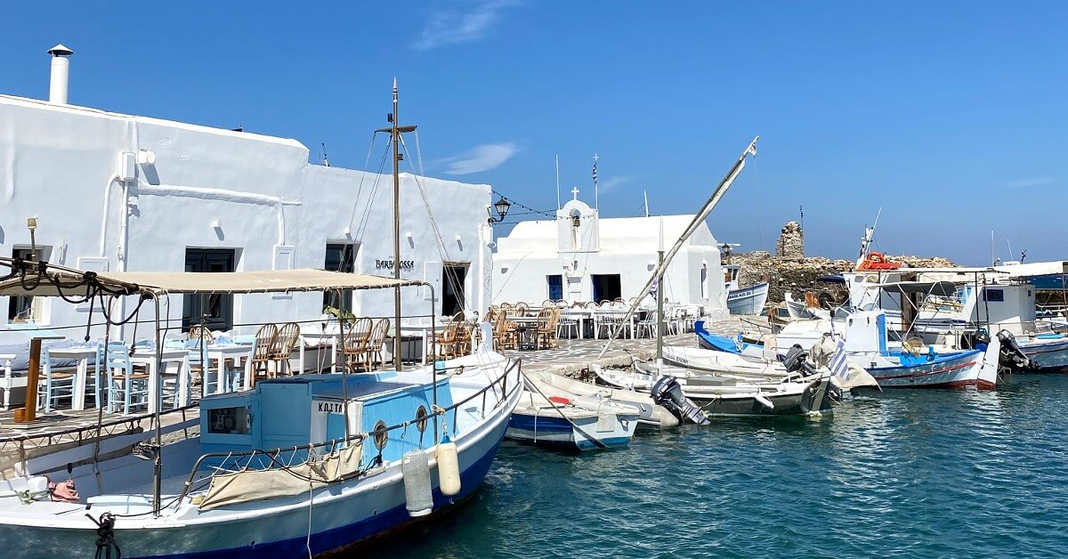 small fishing boats docked in naoussa port paros