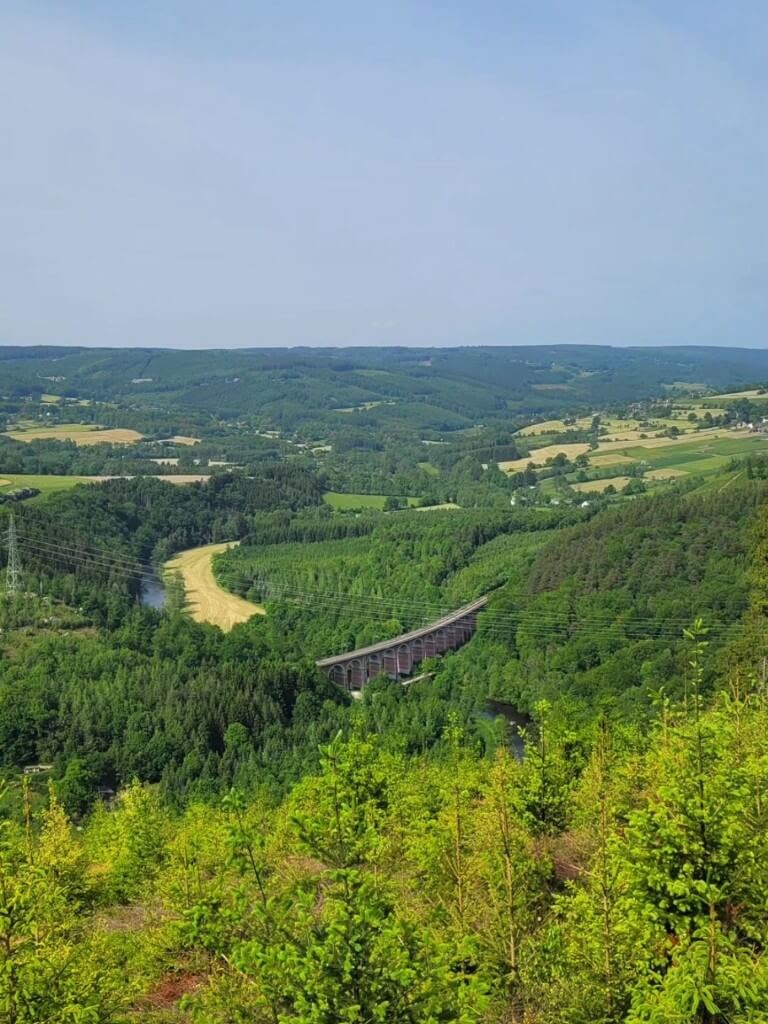 view of a bridge in wallonia beligum from a viepoint on a hike