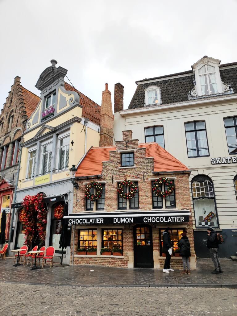 famous small brick house of chocolatier dumon in burge belgium