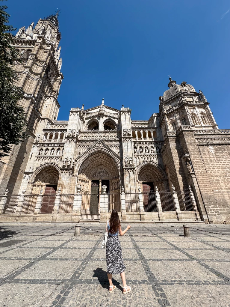natali facing away from the camera looking at tledo cathedral